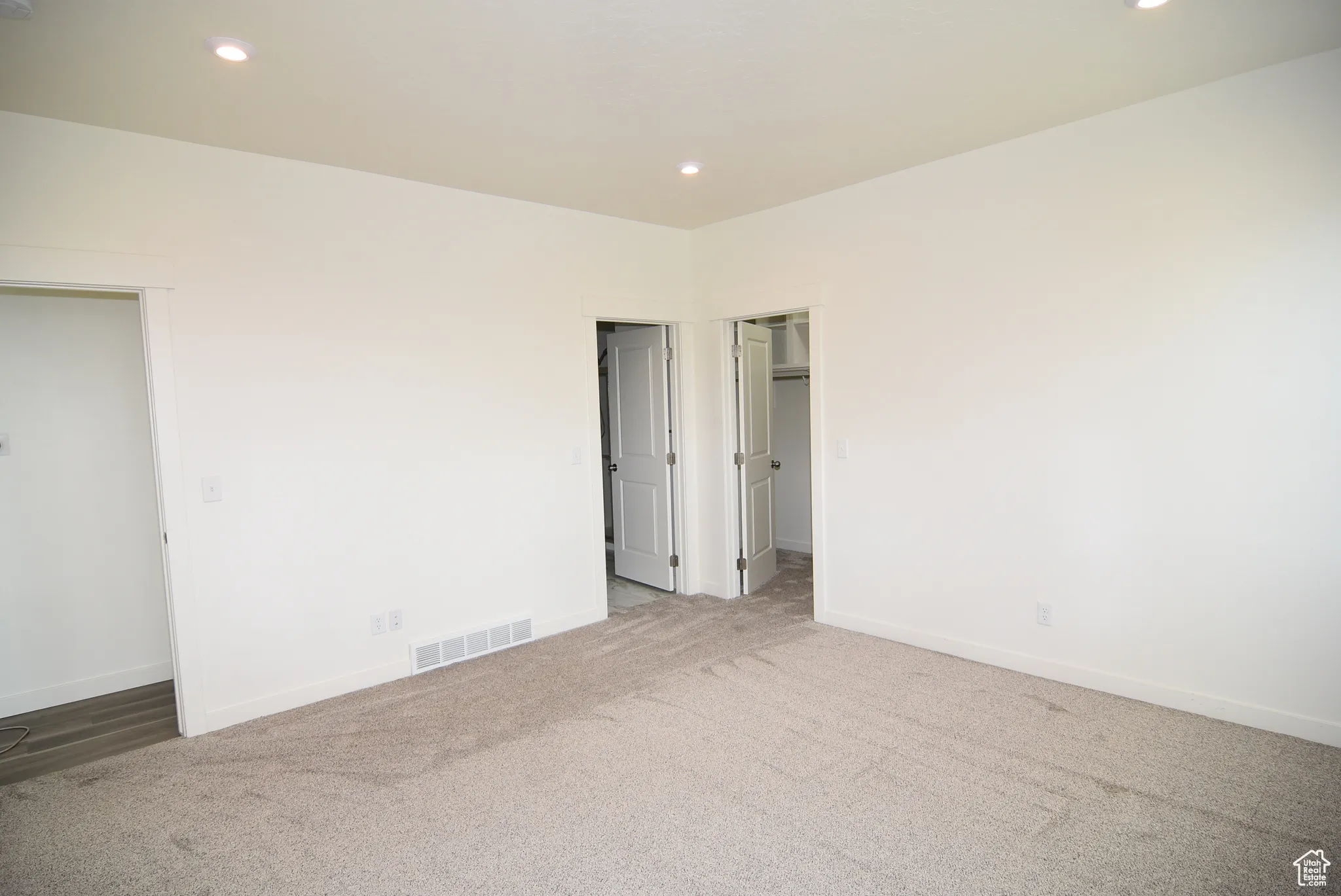 Owner's suite with entrances to bathroom and closet.