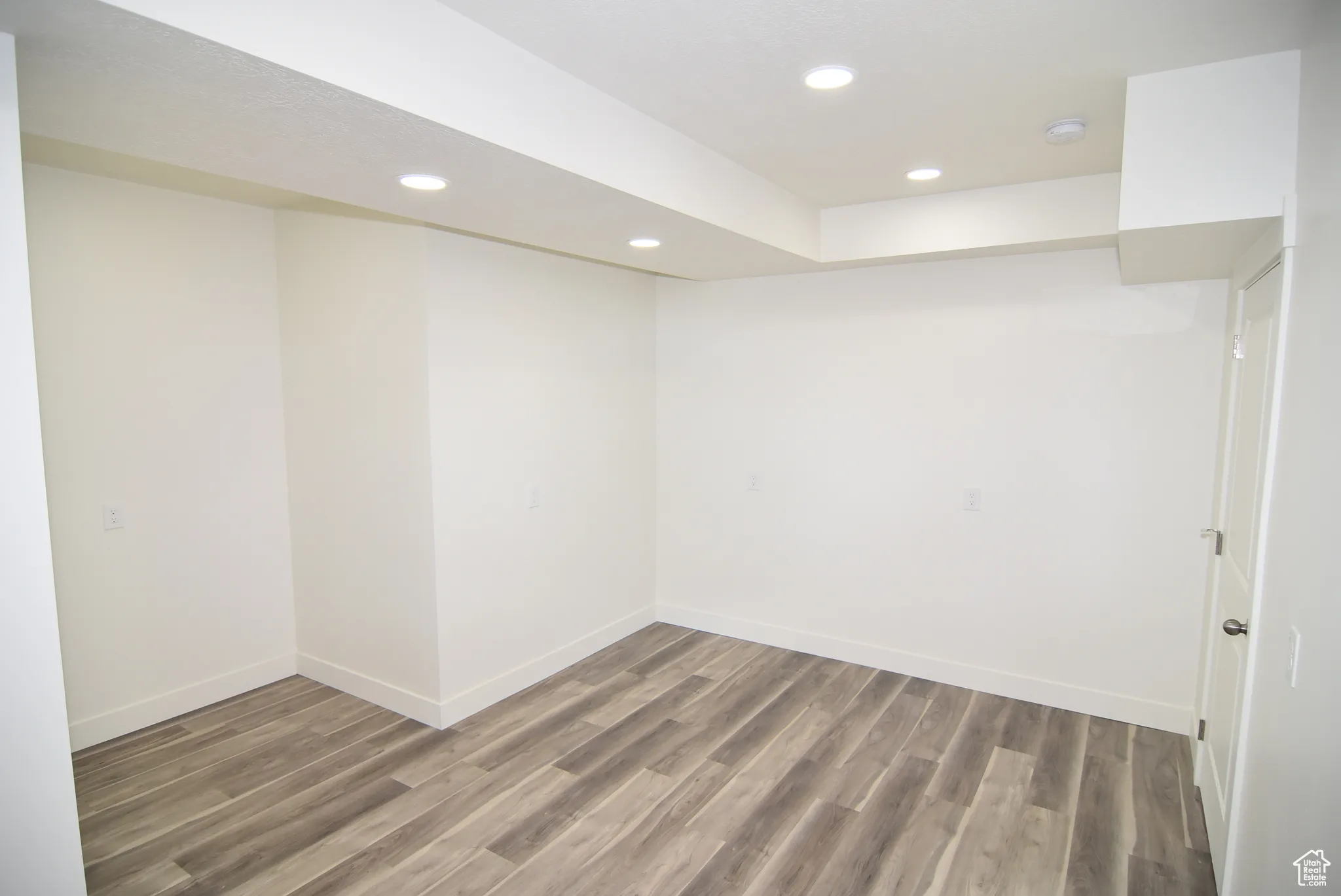 Unfurnished room featuring recessed lighting and light wood-style floors