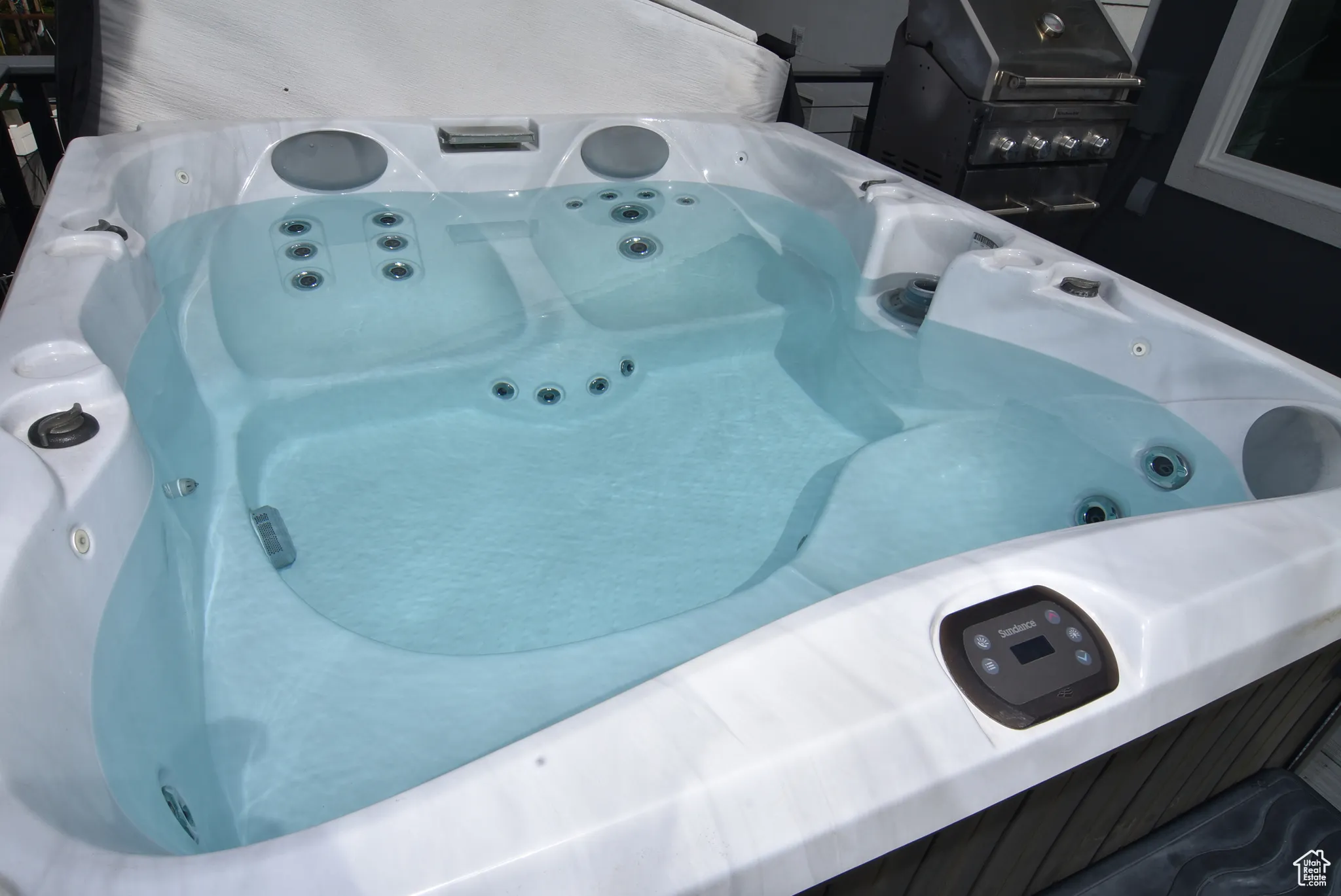 Spa on back mail level deck. Detailed view of a jacuzzi