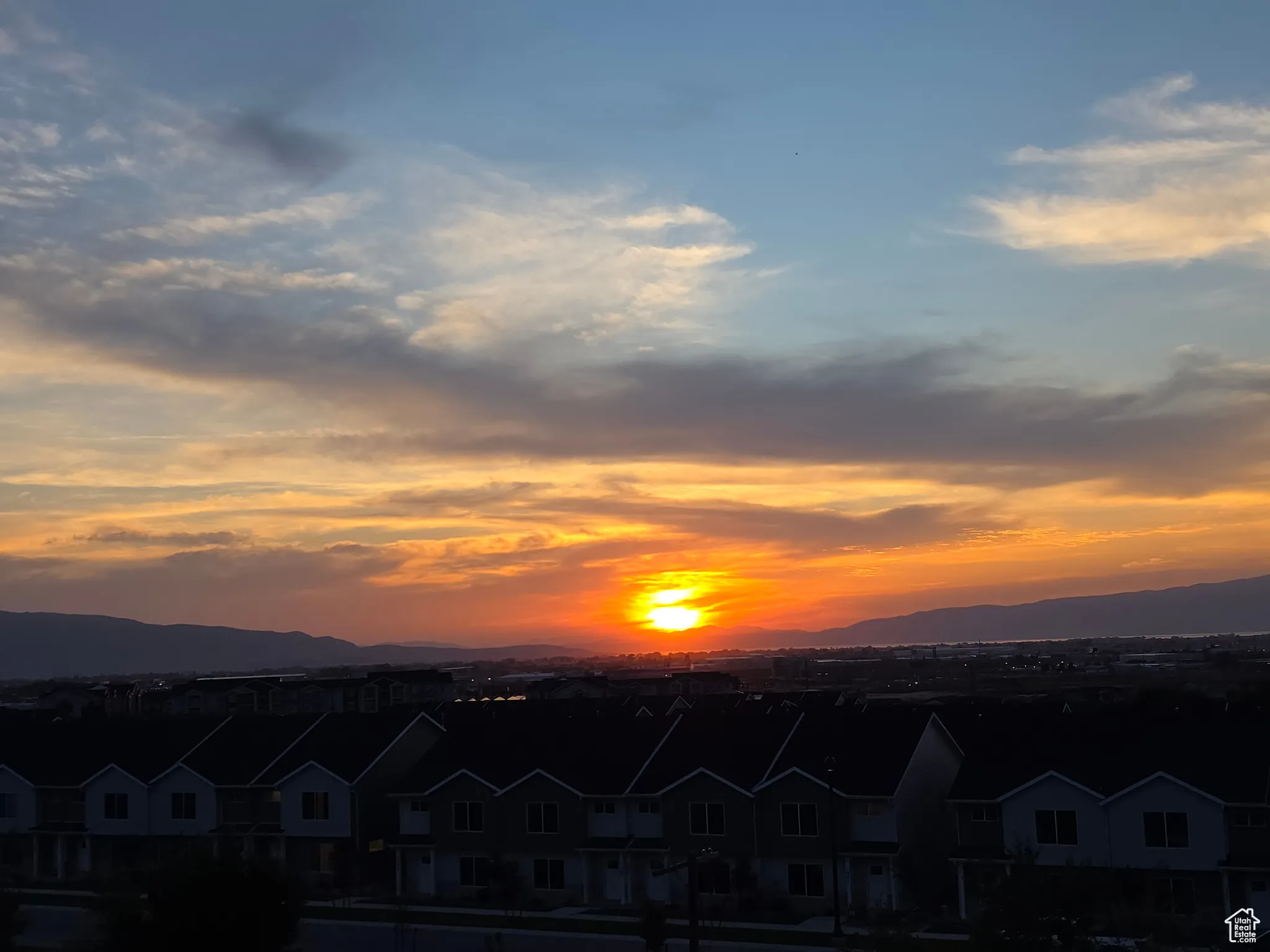 Mountain view featuring nearby suburban area