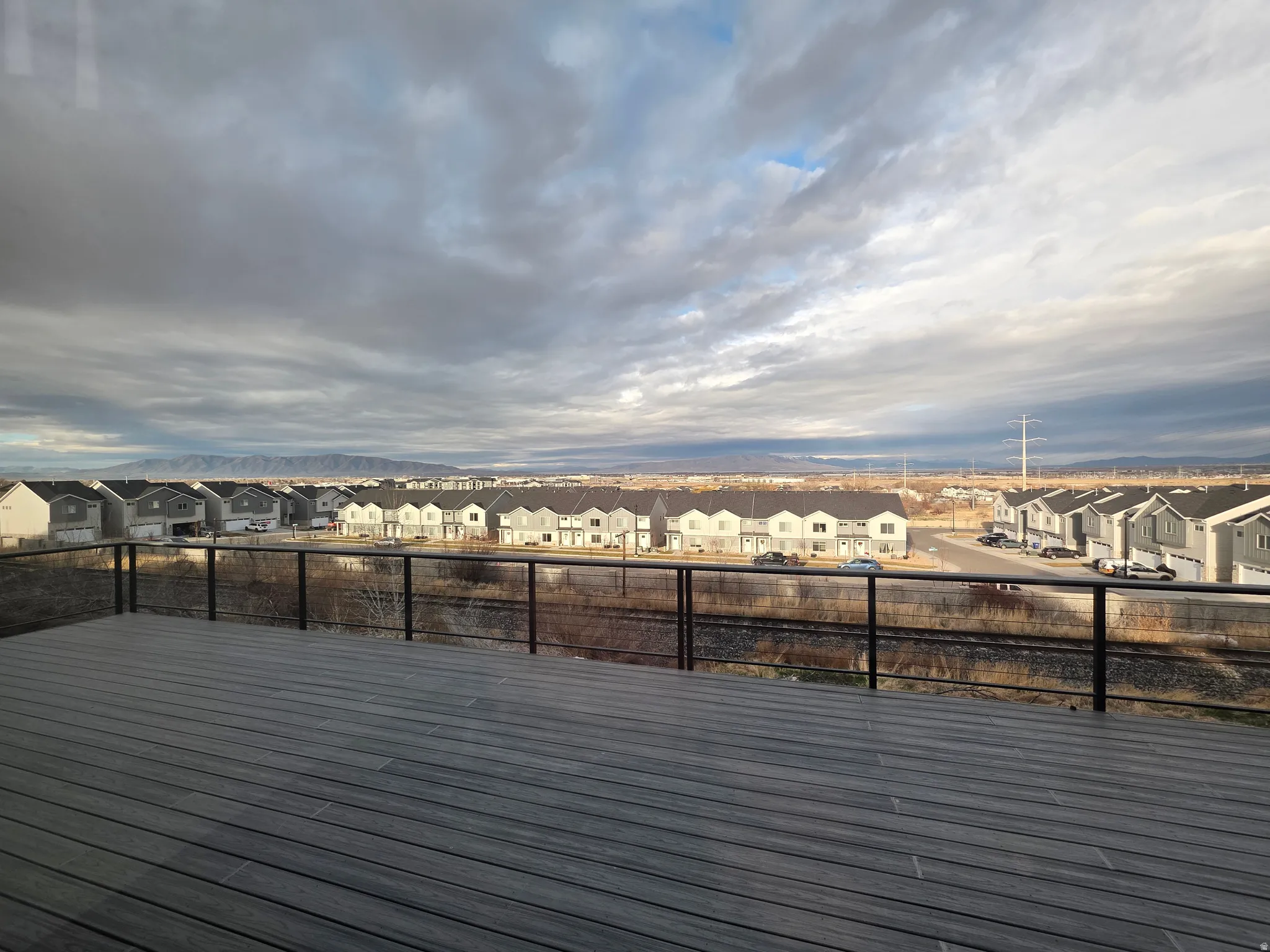 Wooden deck featuring a residential view