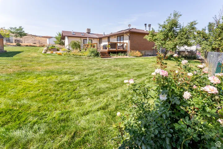 View of yard featuring a deck