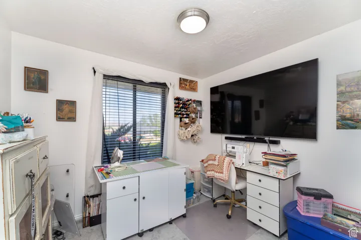 Home office with a textured ceiling