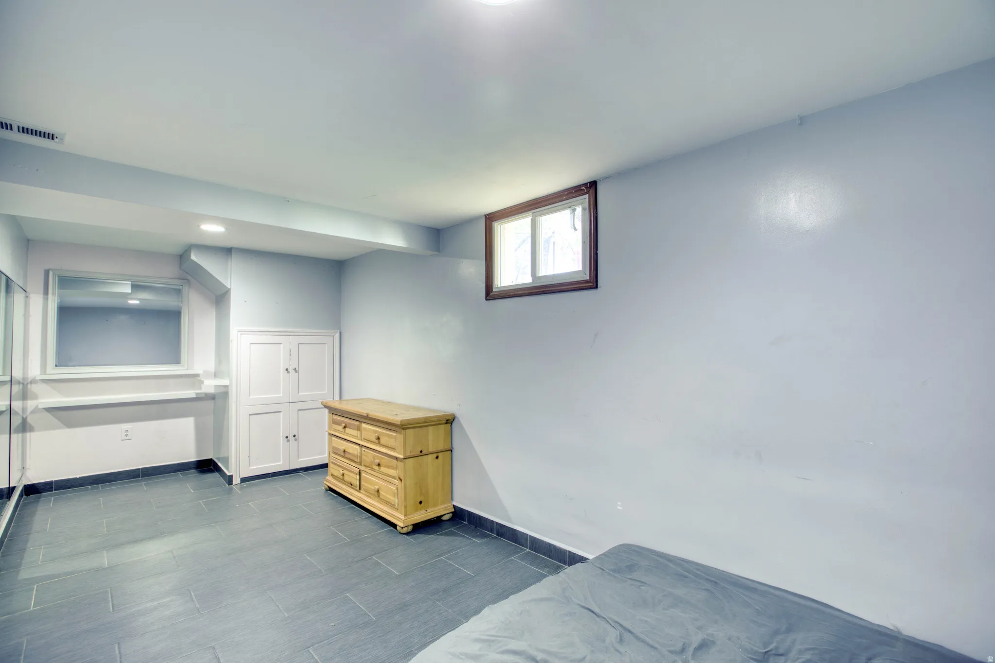 Bedroom with baseboards and recessed lighting