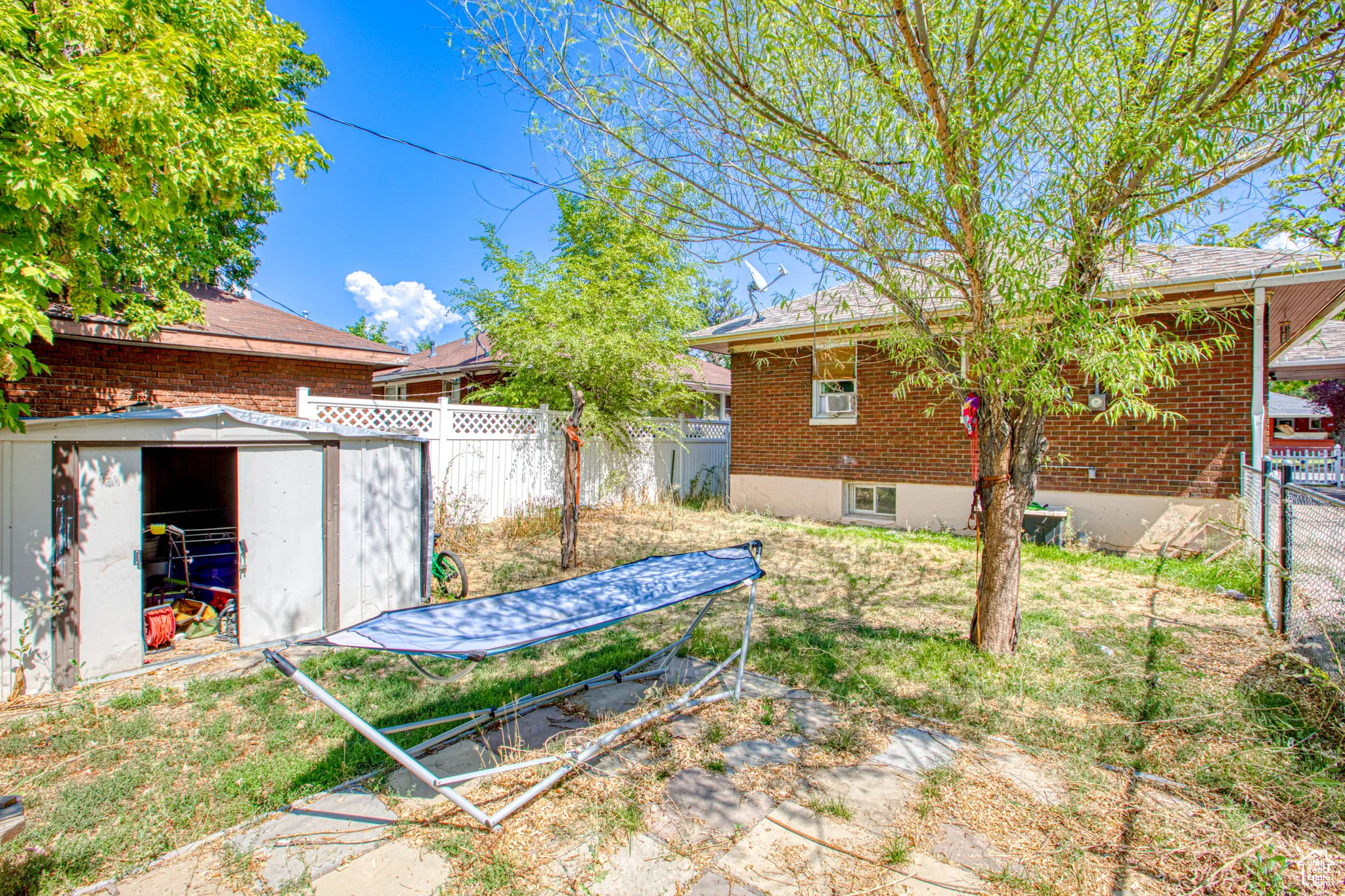 View of yard with a shed