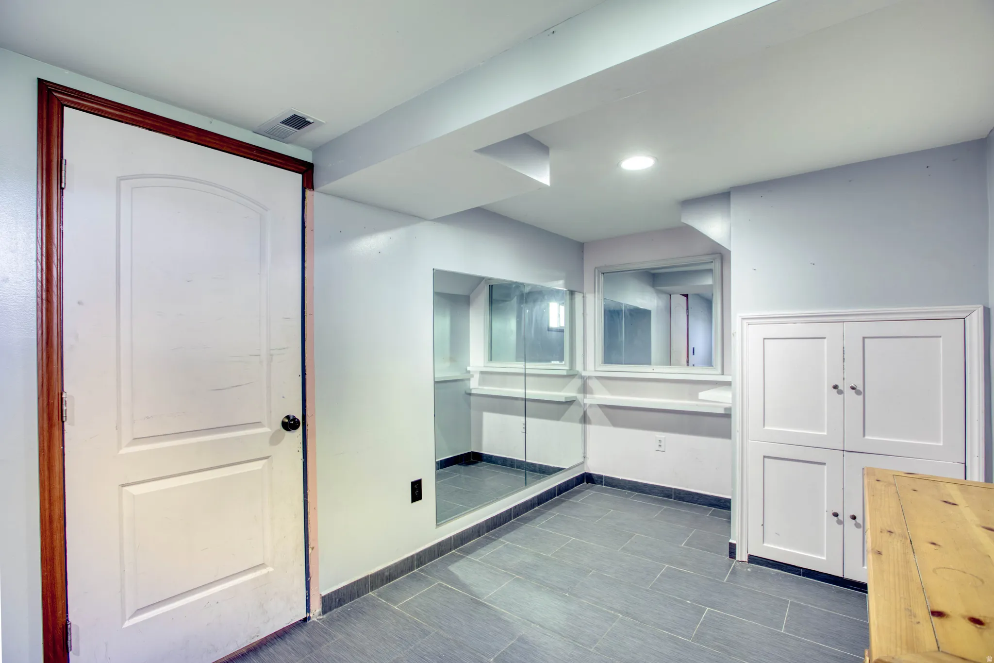 Bathroom featuring vanity and recessed lighting