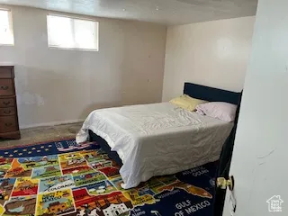 Bedroom with multiple windows