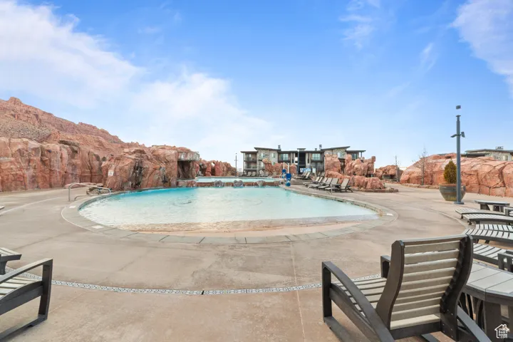 Community pool featuring a patio area