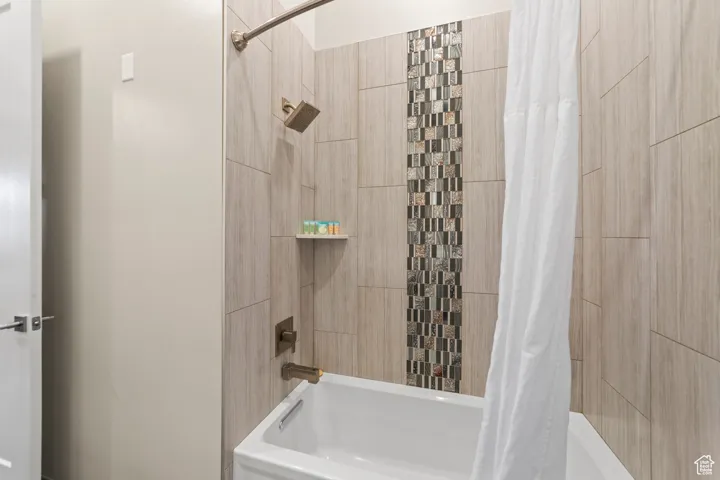 Bathroom featuring shower / bath combo