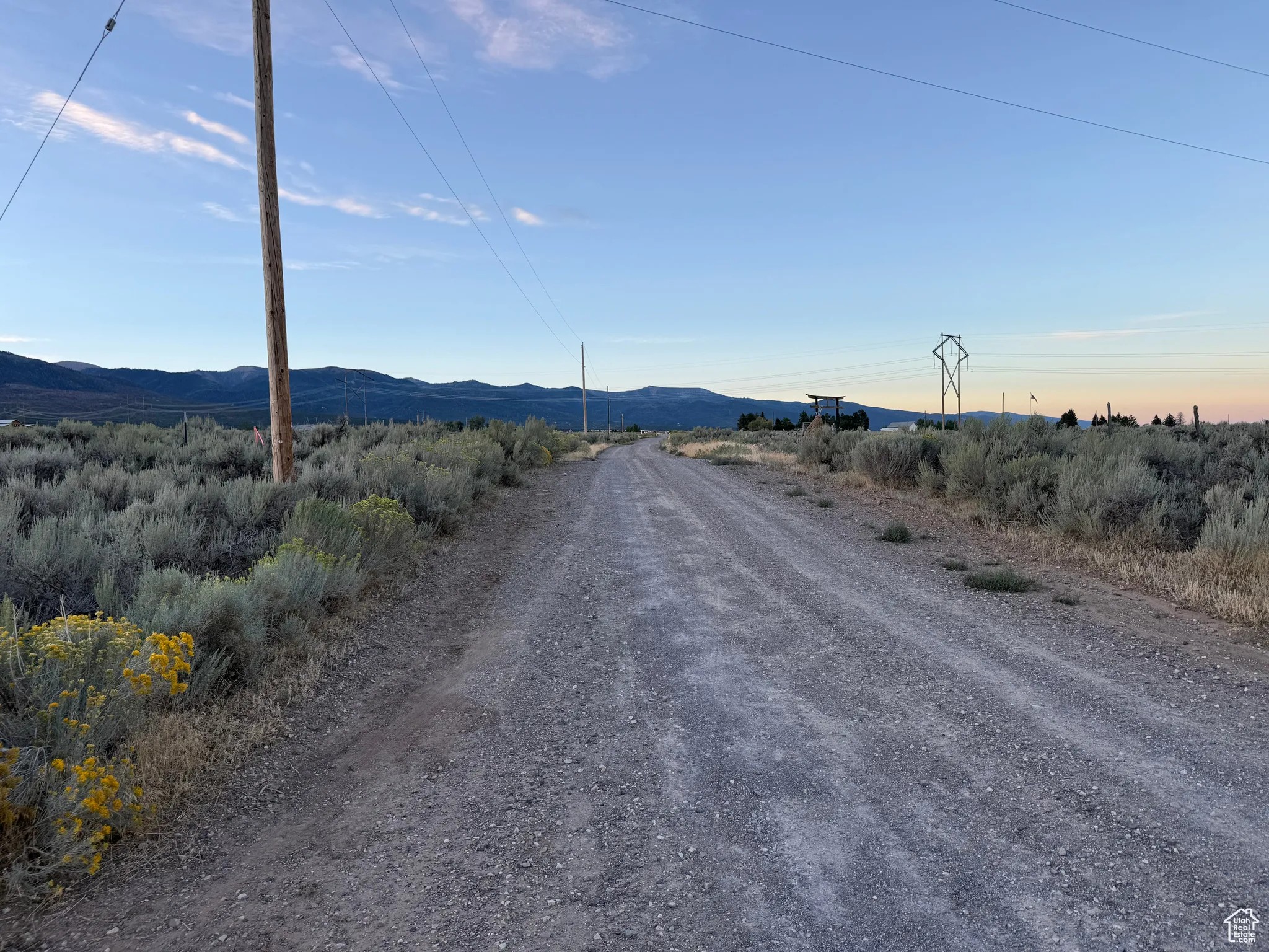 View of road with a mountain view and a view of countryside