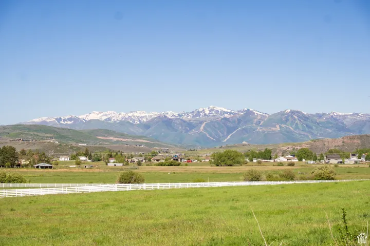 Property view of mountains with a rural view