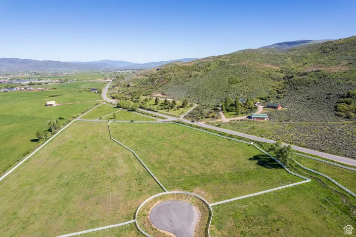 Drone / aerial view with a rural view and a mountain view
