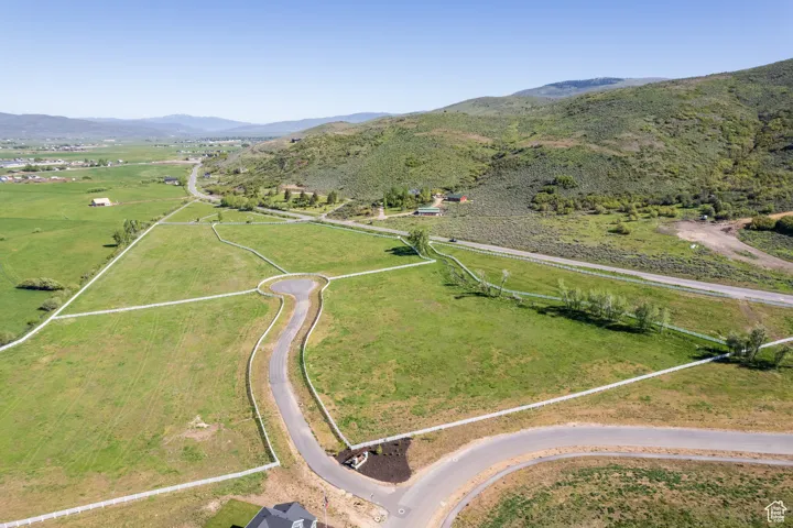 Drone / aerial view featuring a mountain view and a rural view
