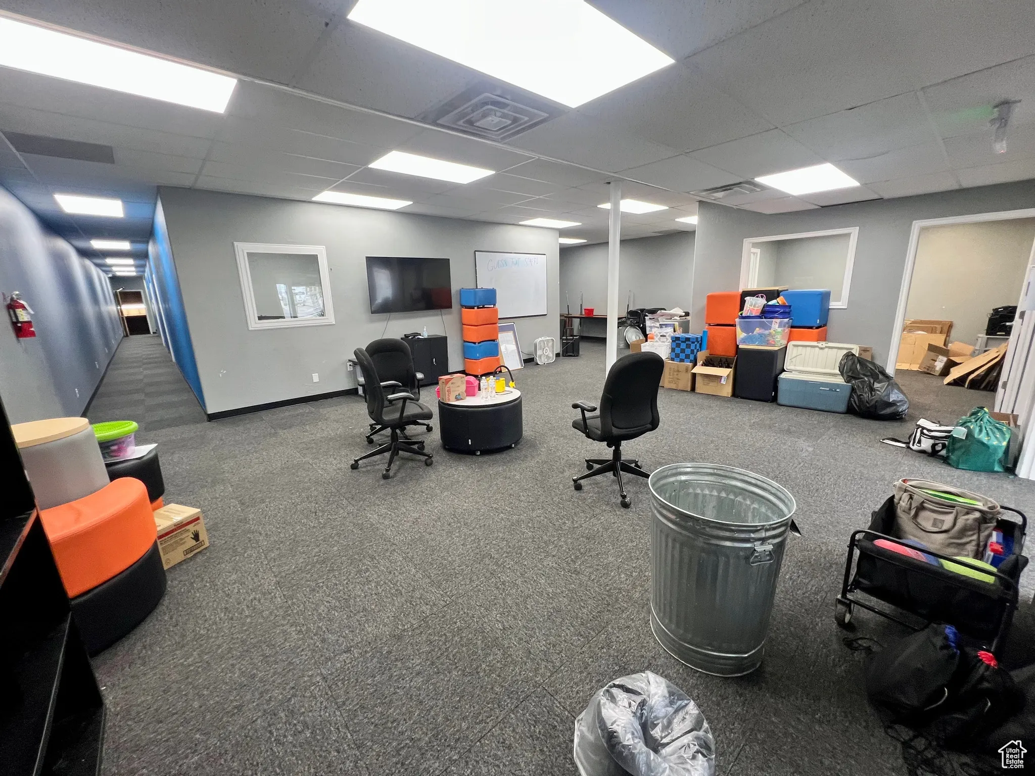 Recreation room featuring a drop ceiling