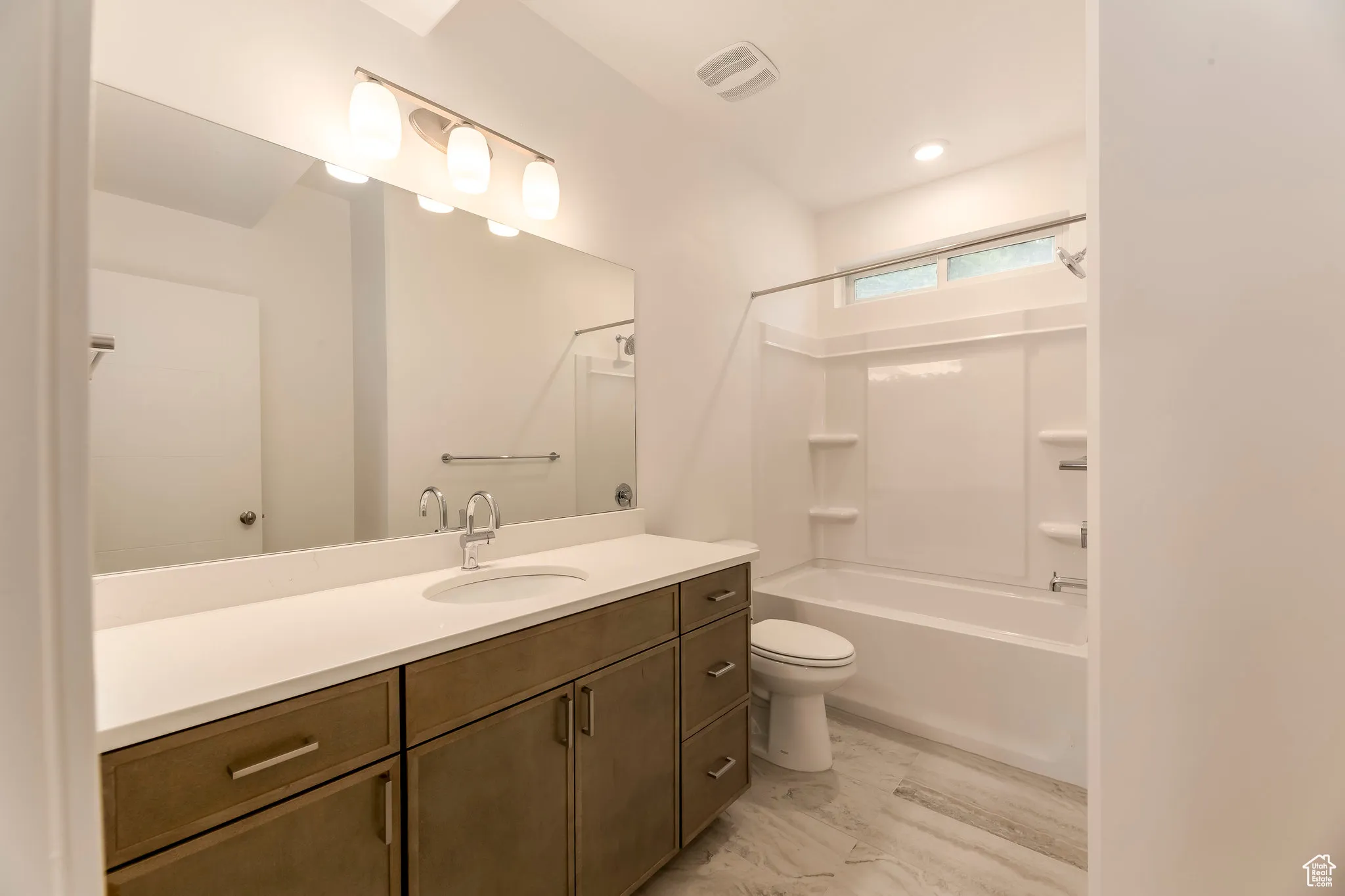 Spa-inspired bath with polished fixtures and calming design.