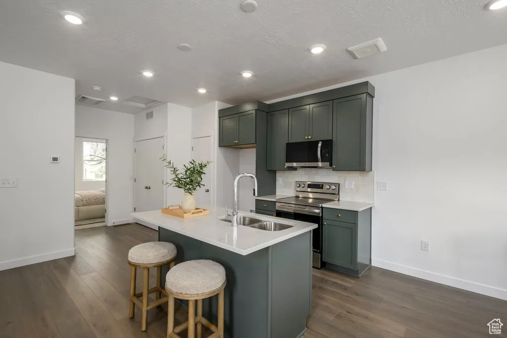 Whether it’s a quick breakfast or dinner with friends, this kitchen makes it easy. *model home
