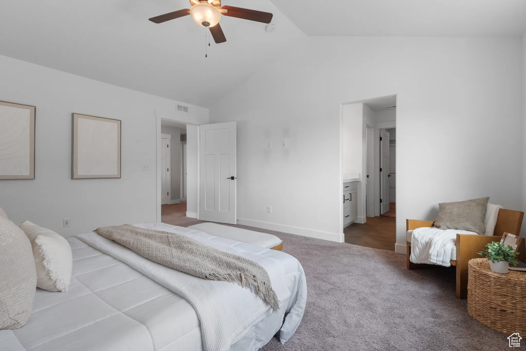 Bedroom featuring carpet floors, a ceiling fan, high vaulted ceiling, and ensuite bathroom