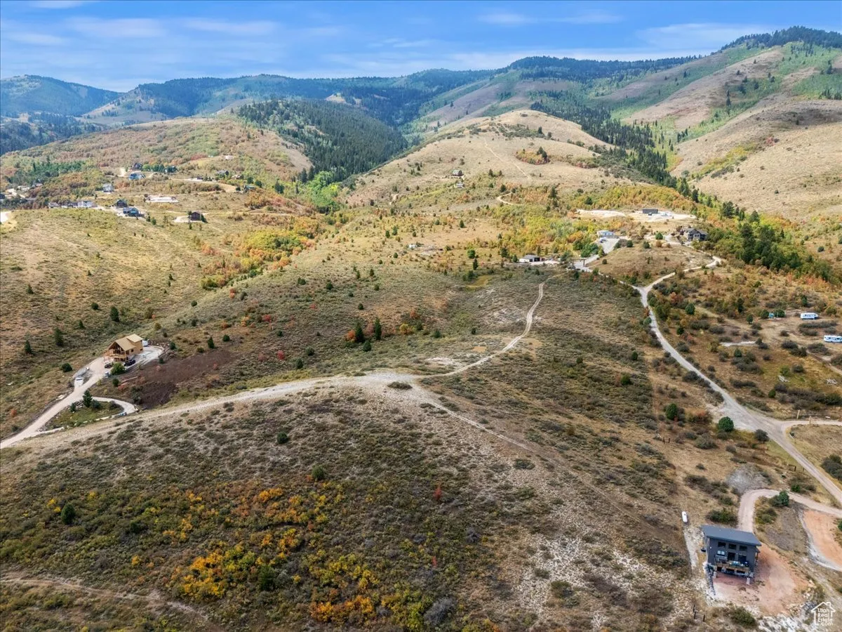 View of property location with mountains and rural landscape