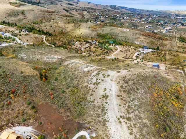 Aerial view of property and surrounding area with rural landscape