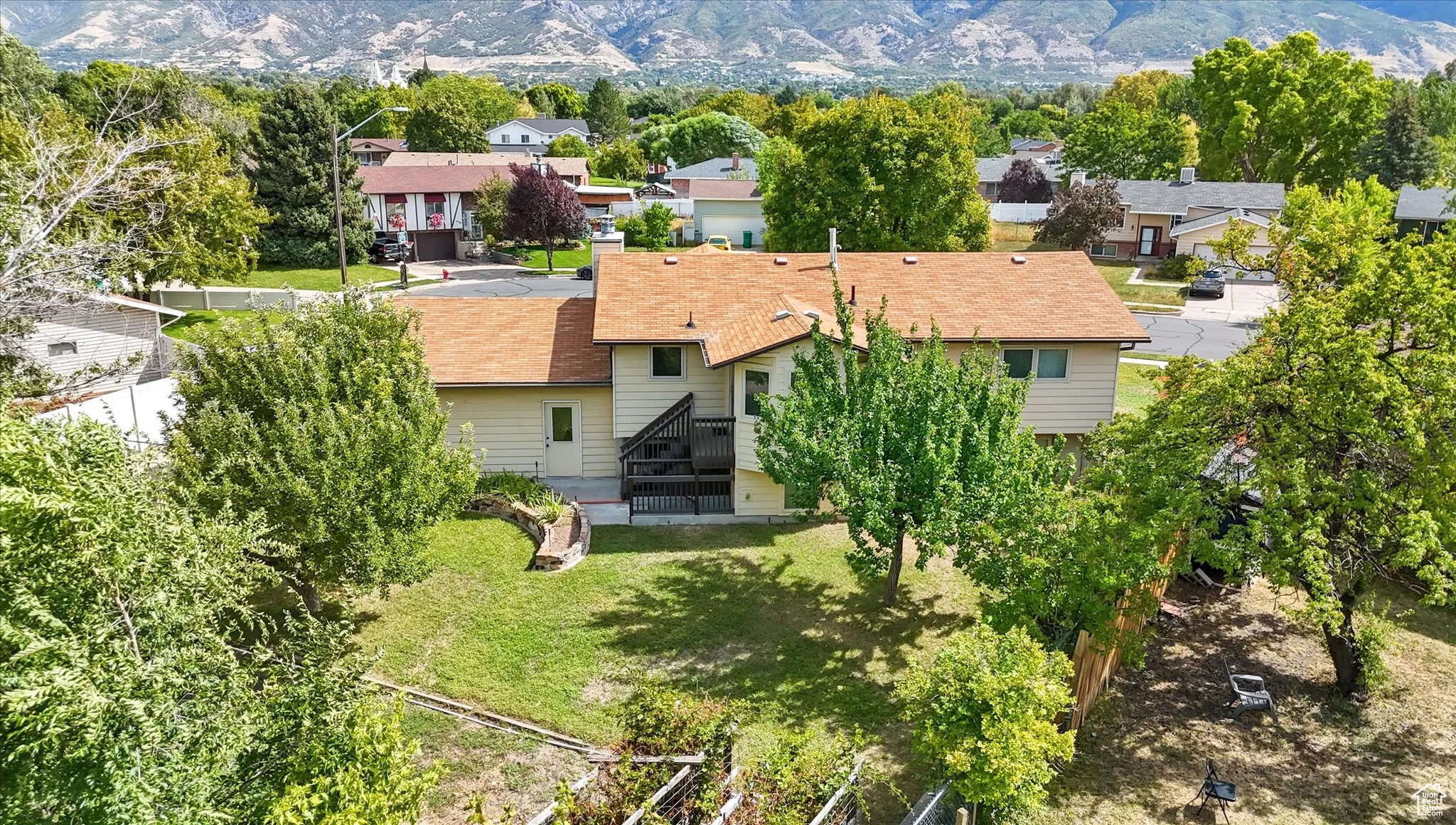 Aerial perspective of suburban area with mountains