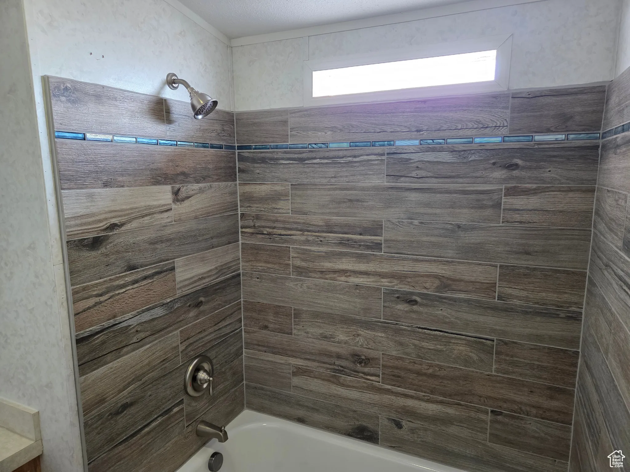 Bathroom with shower / bath combination