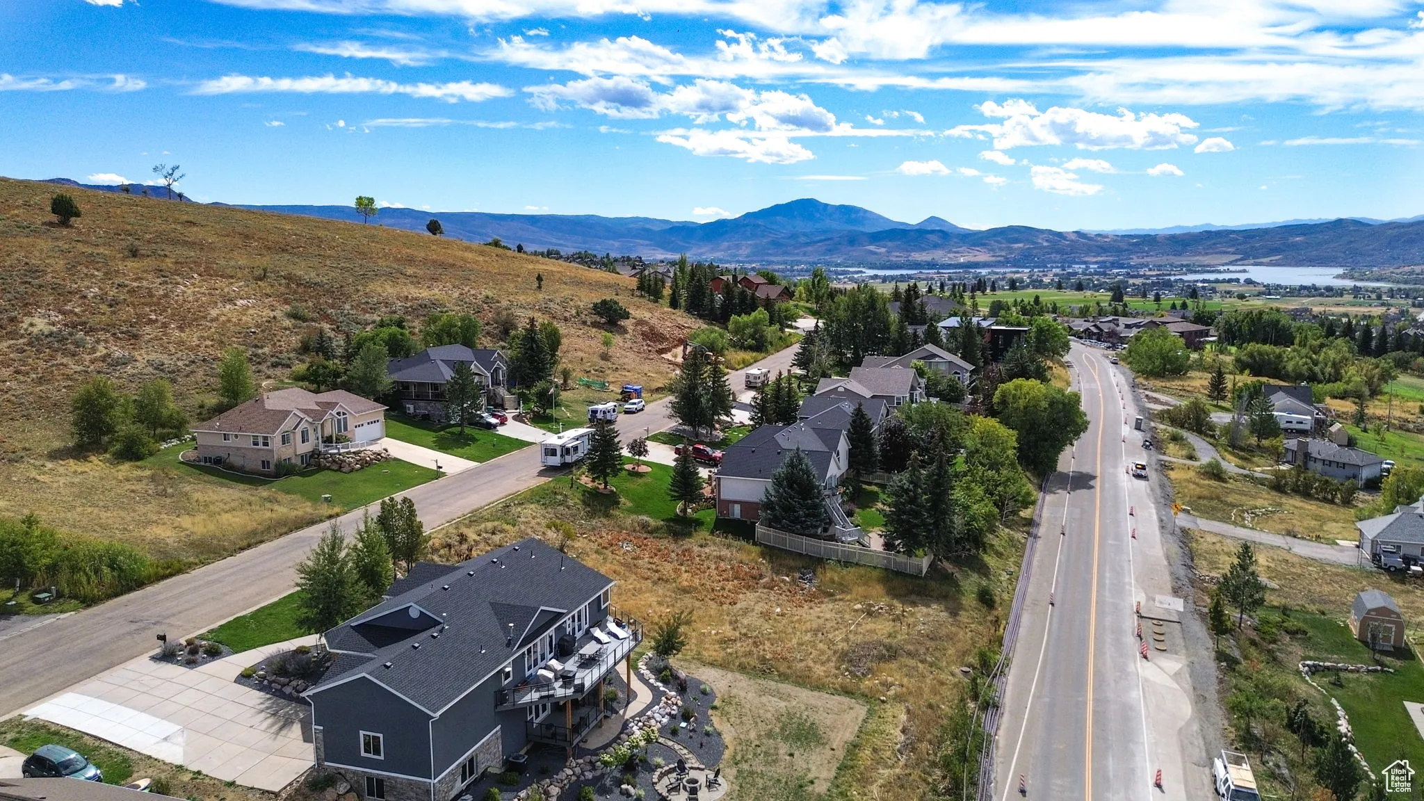 Aerial perspective of suburban area featuring mountains