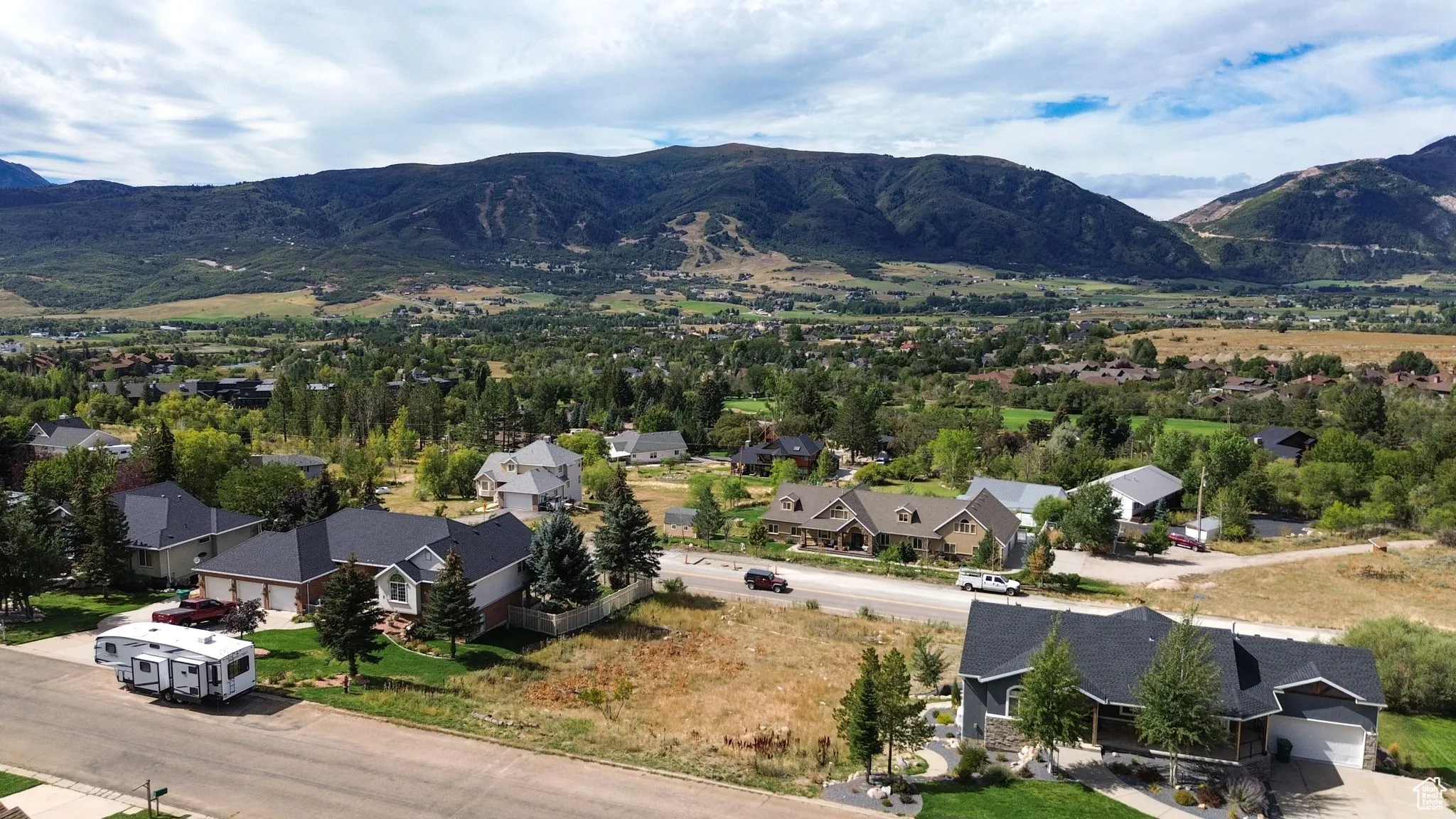 Aerial view of residential area with mountains