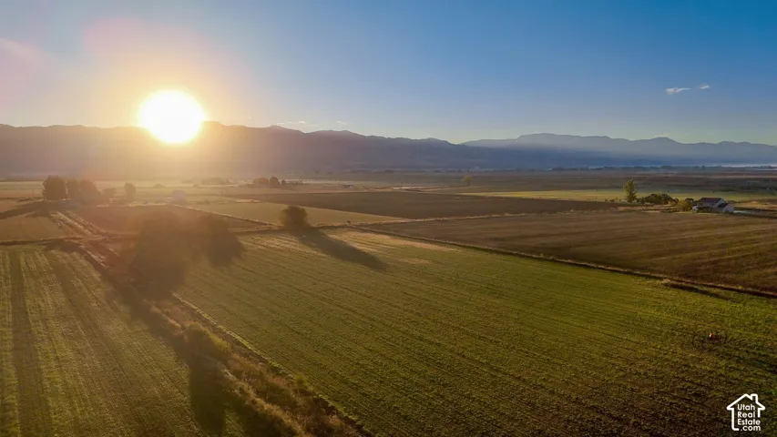 Overview of rural landscape with a mountain backdrop