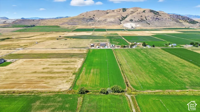 View of property location featuring mountains and rural landscape