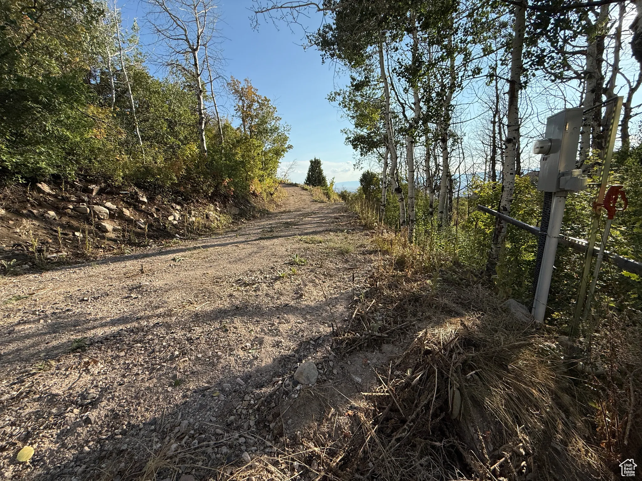 Driveway entering lot 1 from the east road, featuring power/water/septic for visiting trailers/RV's. 200amp #2