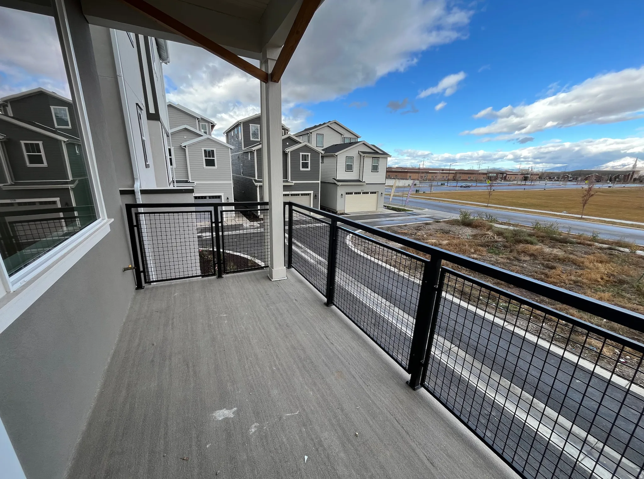 Balcony featuring a residential view