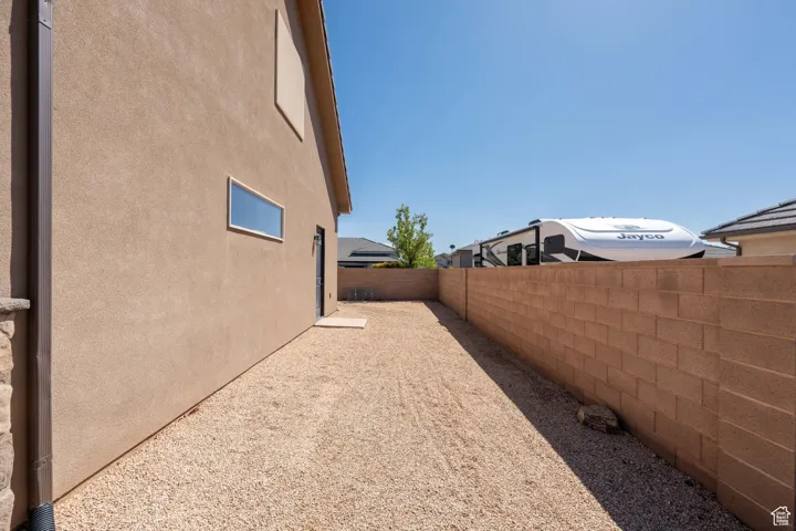 View of fenced backyard