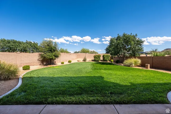 View of fenced backyard