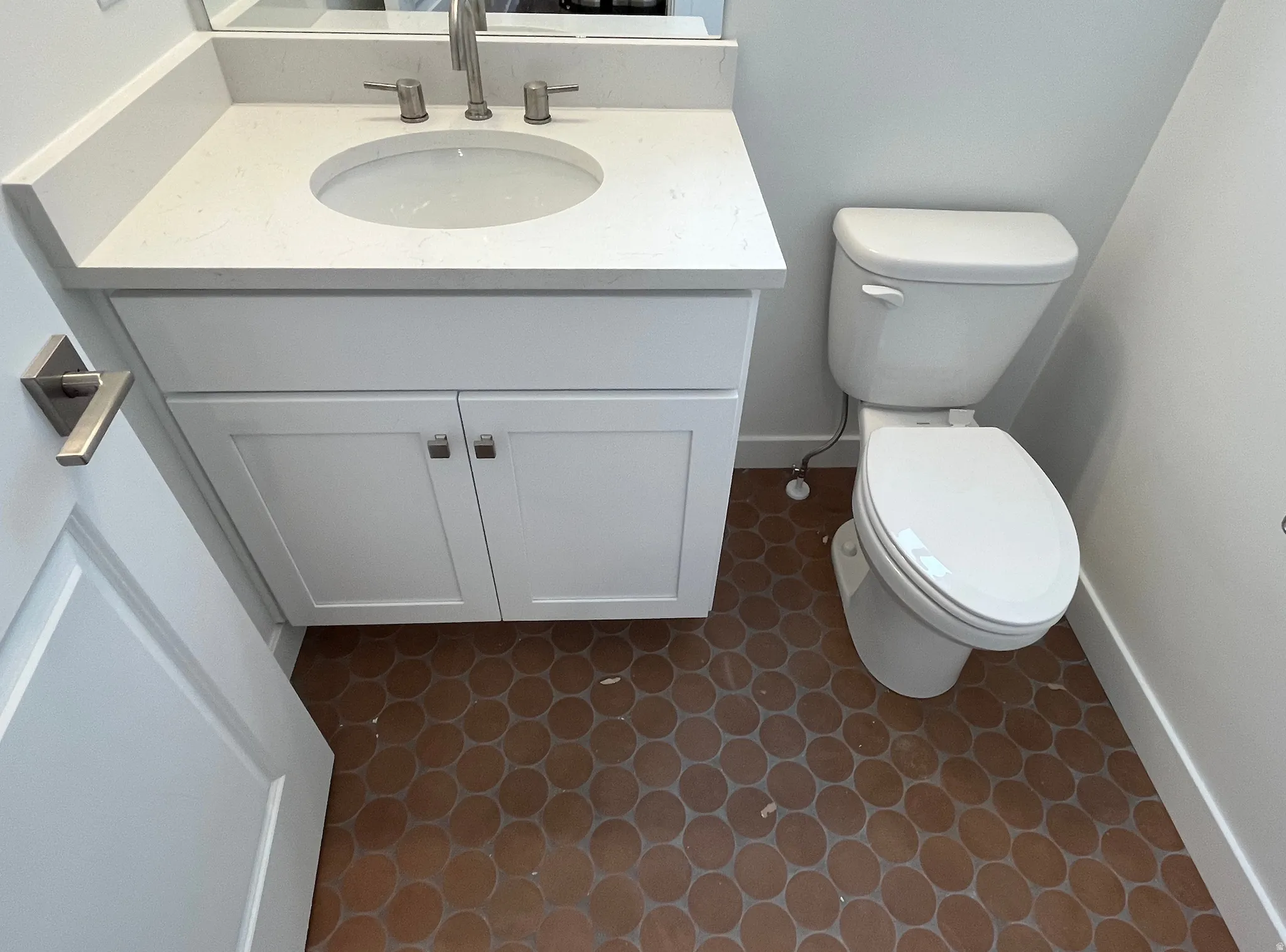 Bathroom featuring toilet and vanity