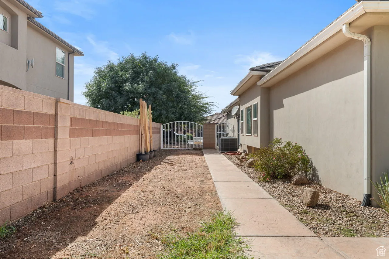 View of yard with a gate