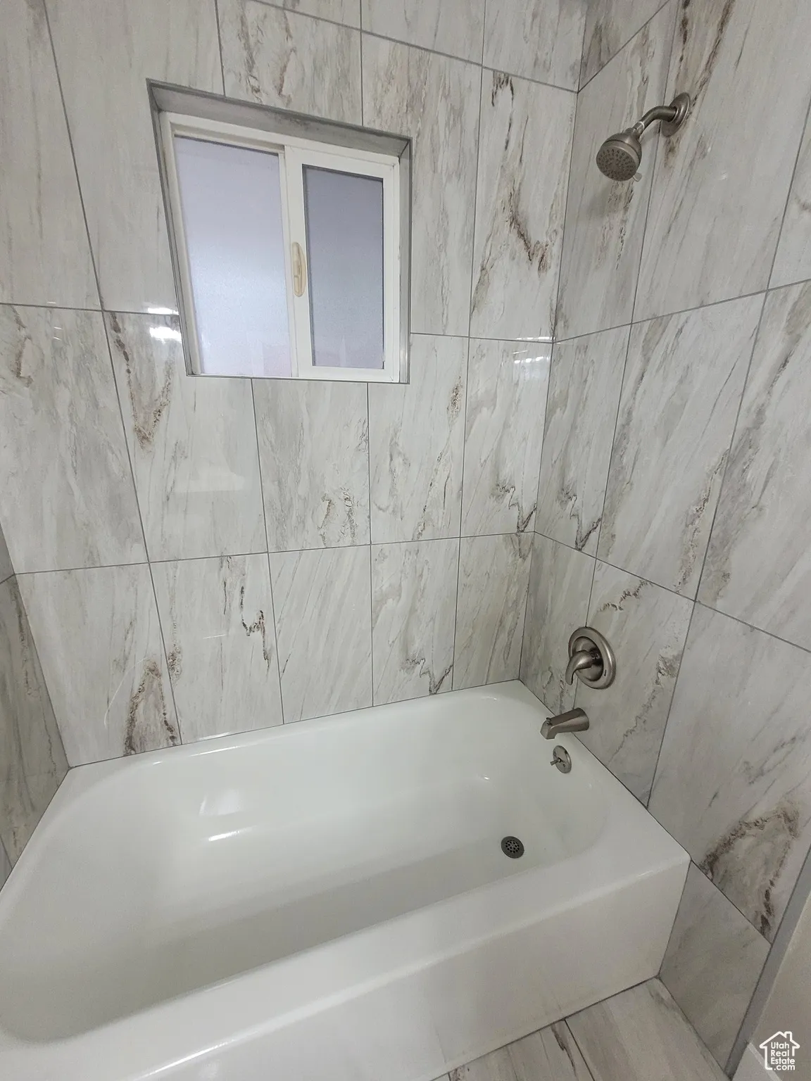 Full bathroom featuring tub / shower combination