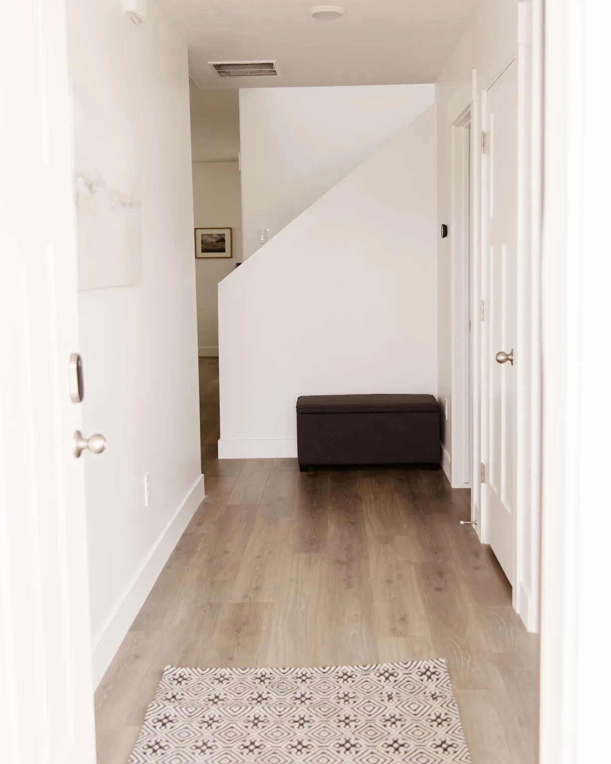Hall with light wood-type flooring