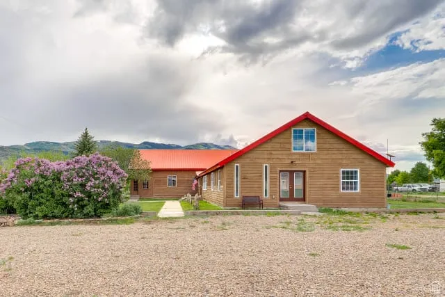 View of front of home with a metal roof