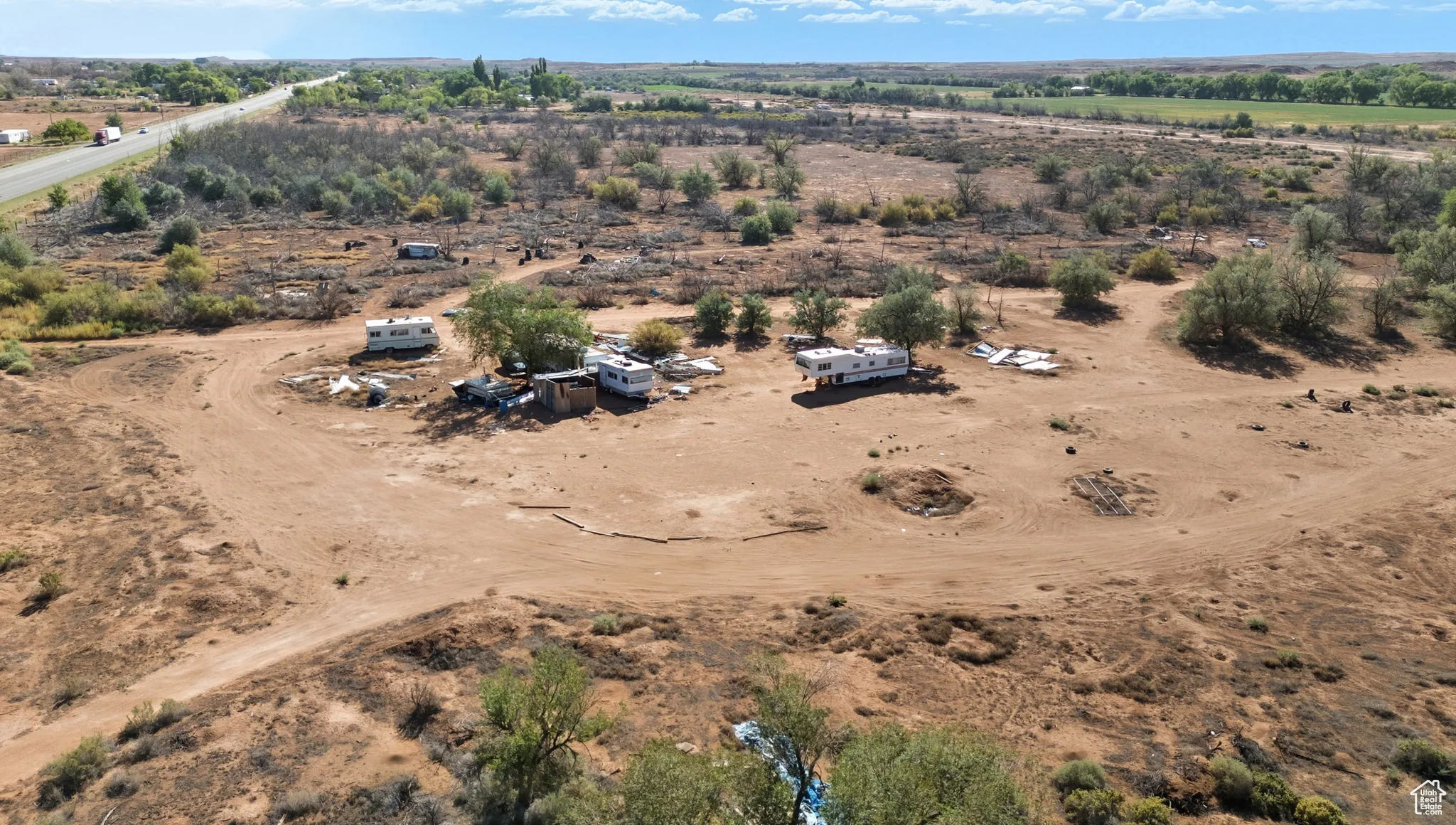 Aerial view of sparsely populated area with a desert landscape