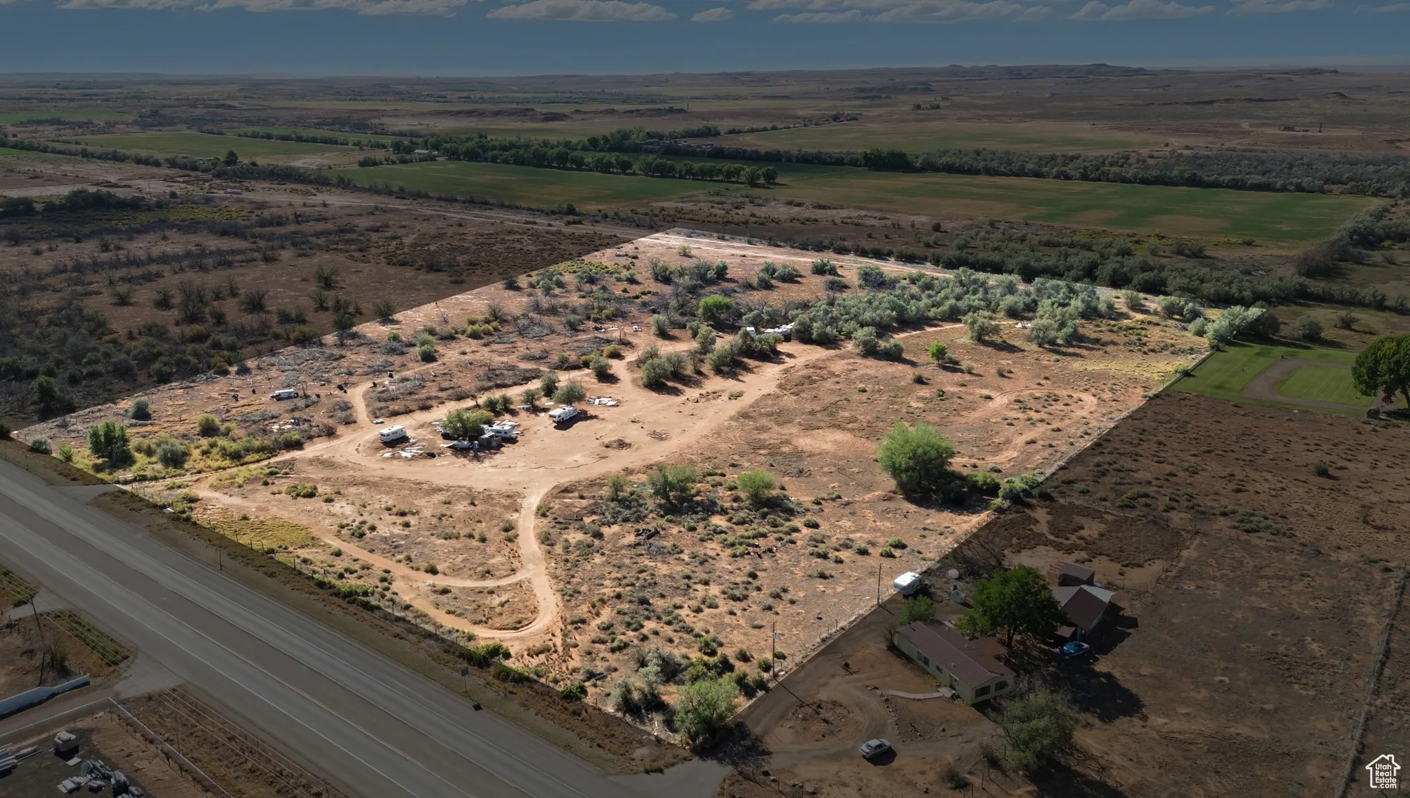 Aerial view of property's location with rural landscape