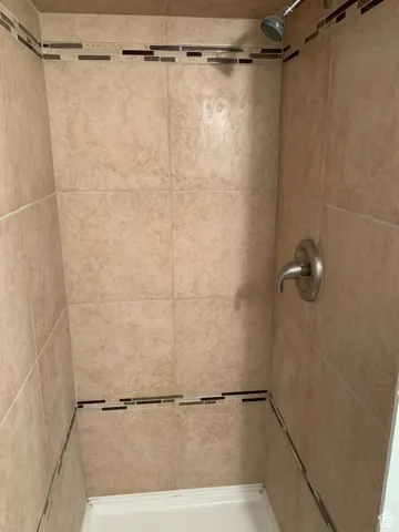 Bathroom featuring a stall shower