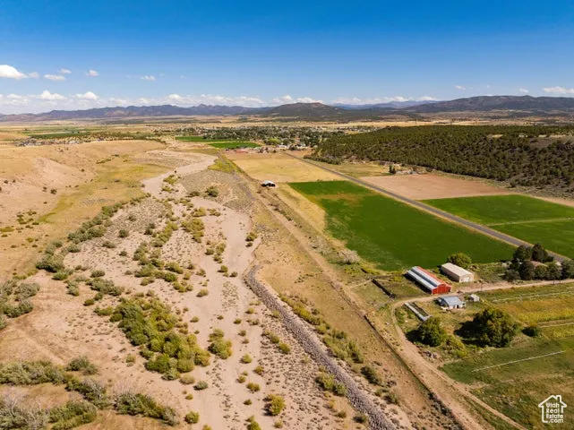 Overview of rural landscape with a mountainous background