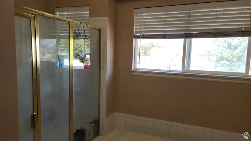 Primary Bathroom with walkin shower, soaker tub