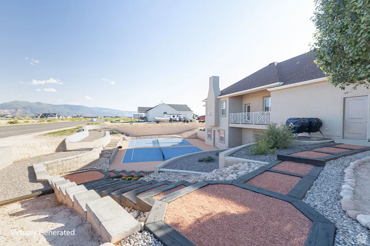 View of swimming pool with a balcony, a mountain view, a patio, and a residential view