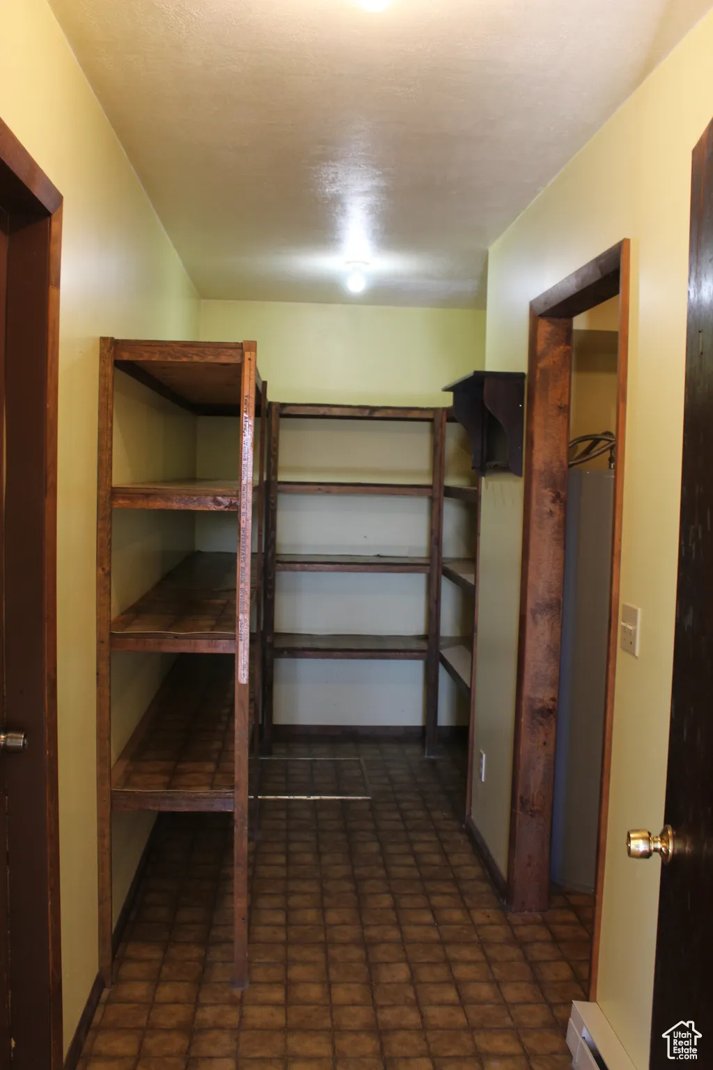 Storage area with a baseboard radiator