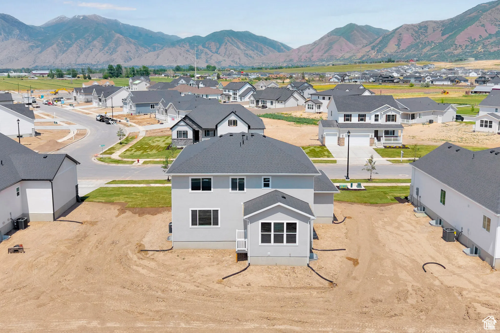Aerial view of residential area with mountains