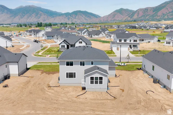 Aerial view of residential area with mountains