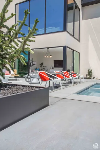 View of patio with an outdoor pool