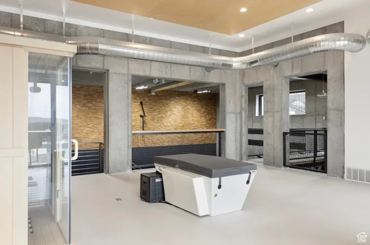 Reception area featuring a towering ceiling