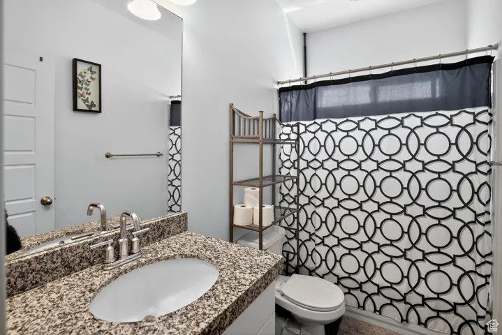 Bathroom with vanity and toilet